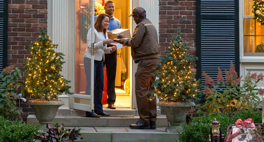UPS worker delivering packages before the christmas shipping deadlines
