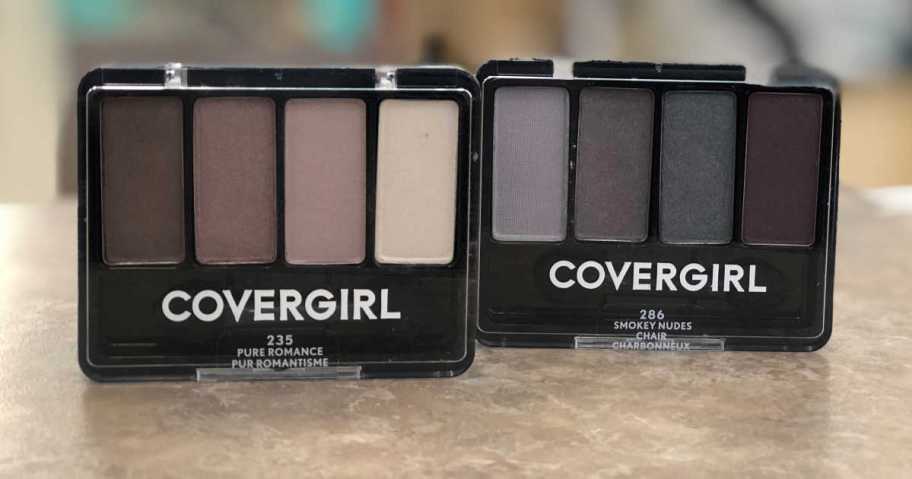 two CoverGirl Eyeshadows standing on table