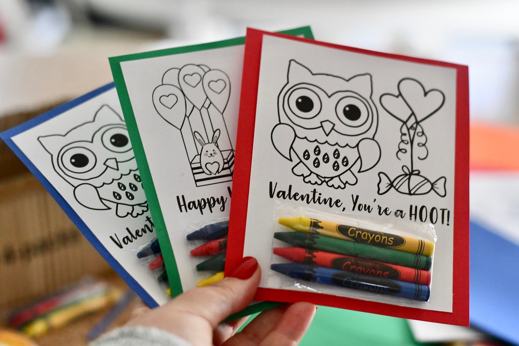 DIY Crayon Valentines fanned out in someone's hand