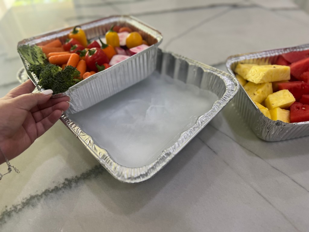 Placing food on top of a frozen food tray is one of the best food hacks to know