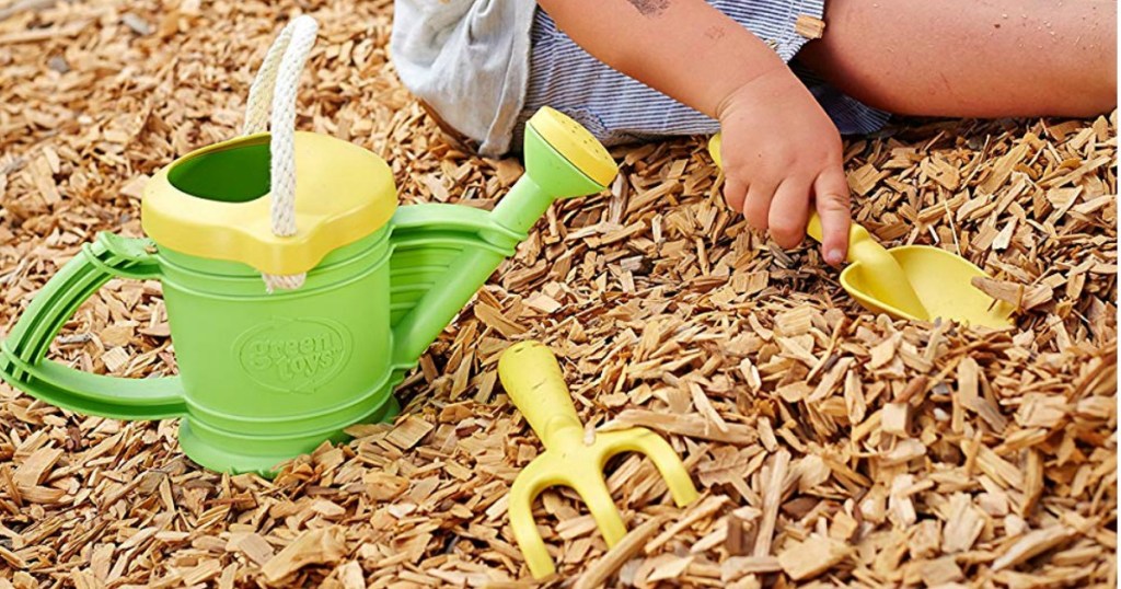 green and yellow gardening toys at playground
