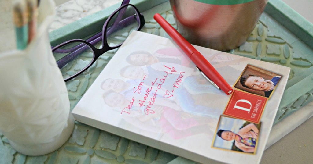 notepad on tray with pen & glasses