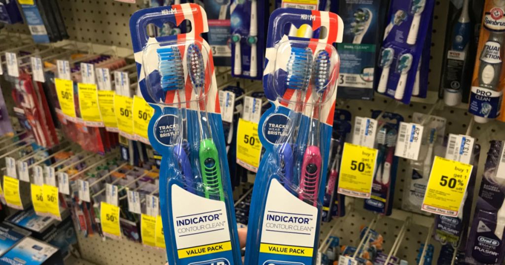 oral b toothbrushes in front of shelf