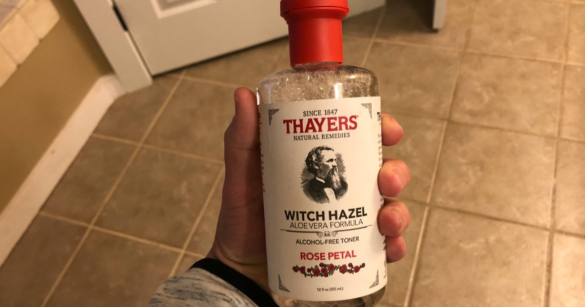 hand holding a bottle of Thayers Rose Petal Witch Hazel toner