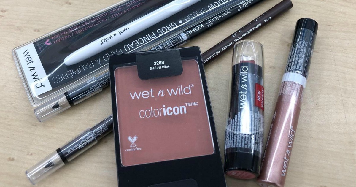 wet and wild cosmetics and makeup brushes on a counter