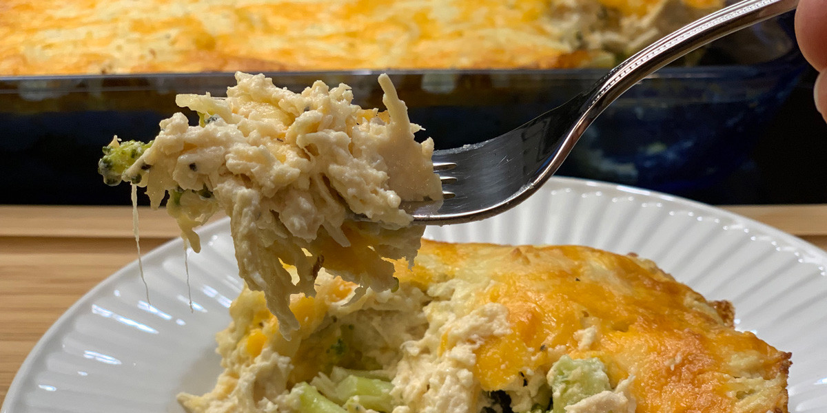 Hip2Ketobroccoli cheddar chicken recipe - up close image of the casserole on a fork