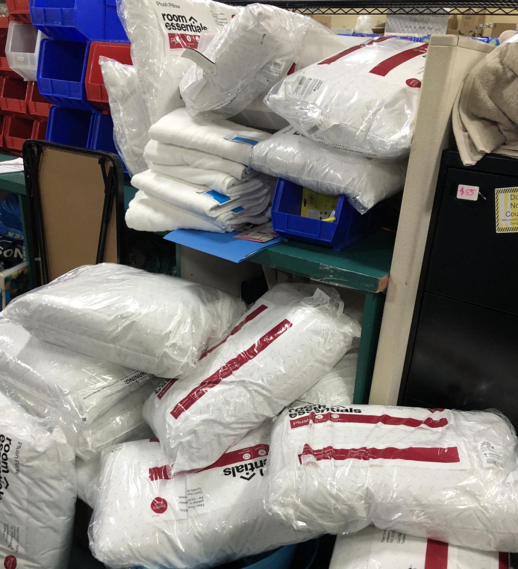 pile of pillows and towels for zaman international
