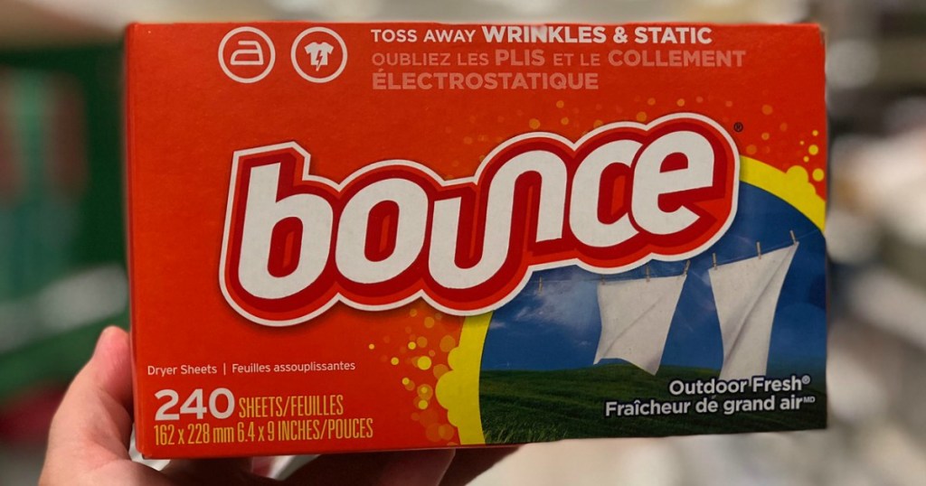 hand holding up box of bounce dryer sheets