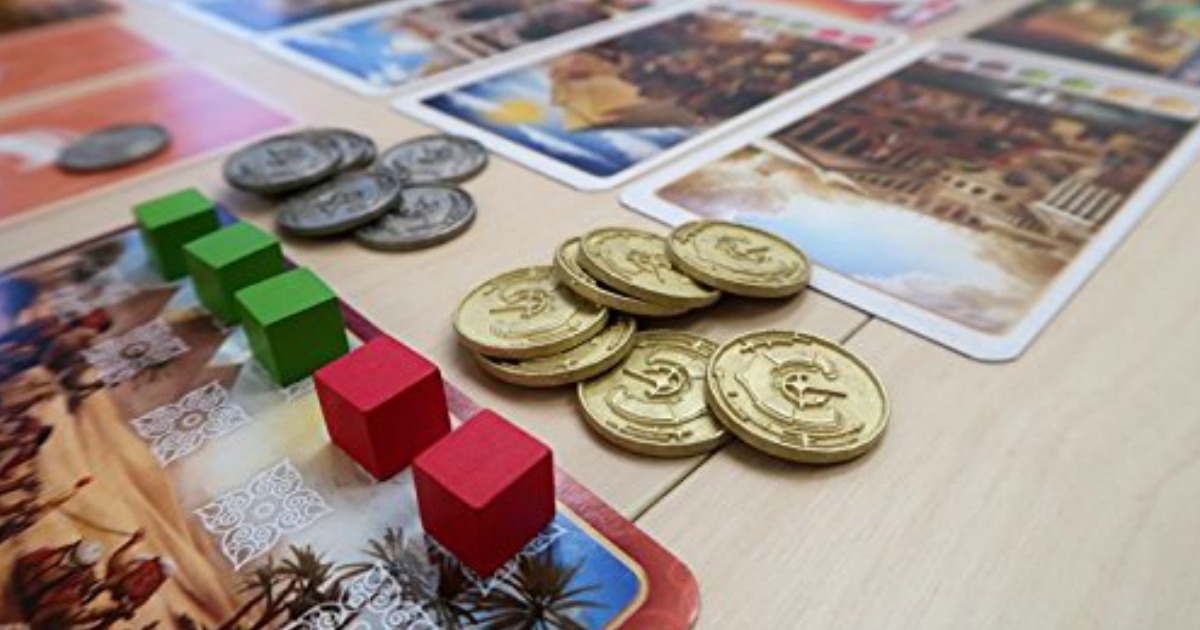 century board game pieces and coins