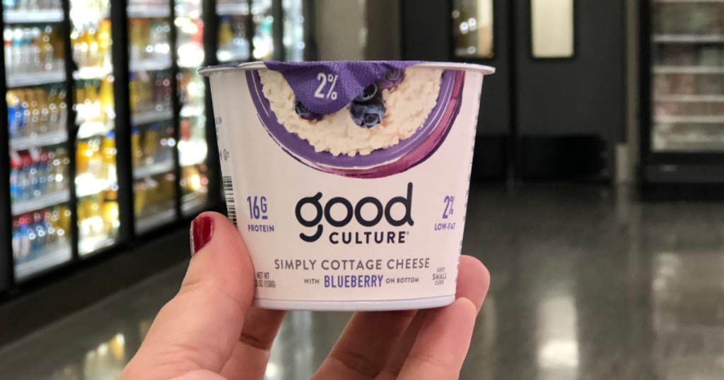 hand holding good culture cottage cheese at target