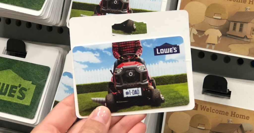 hand holding a Lowe's gift card