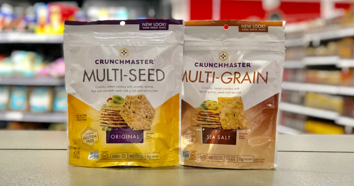 two bags of crunchmaster crackers on table in Target store