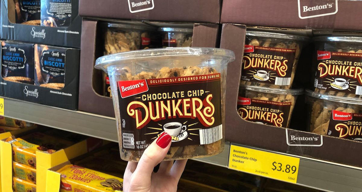 hand holding container of chocolate chip dunker cookies