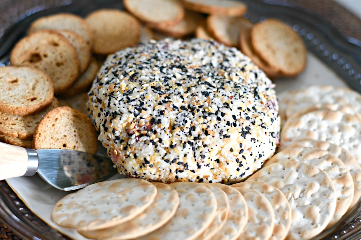 plate of homemade cream cheese ball with crackers 