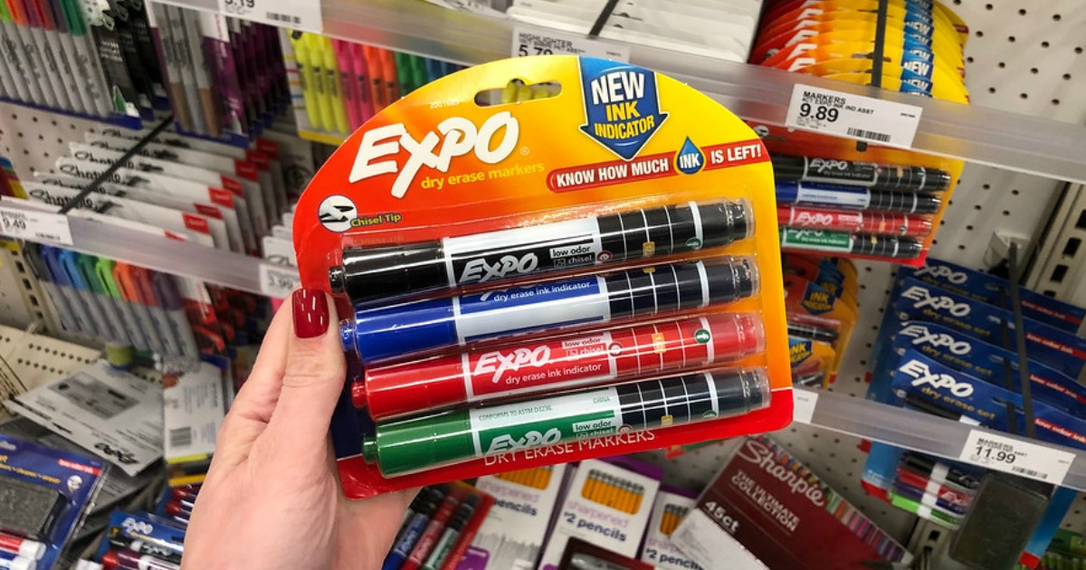 hand holding expo dry erase markers with indicators