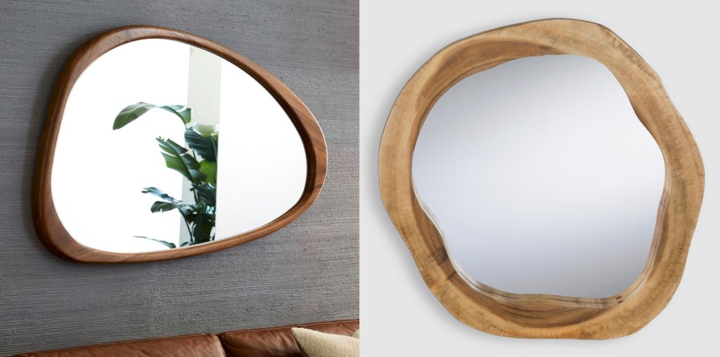 two wood framed mirrors hanging on walls 