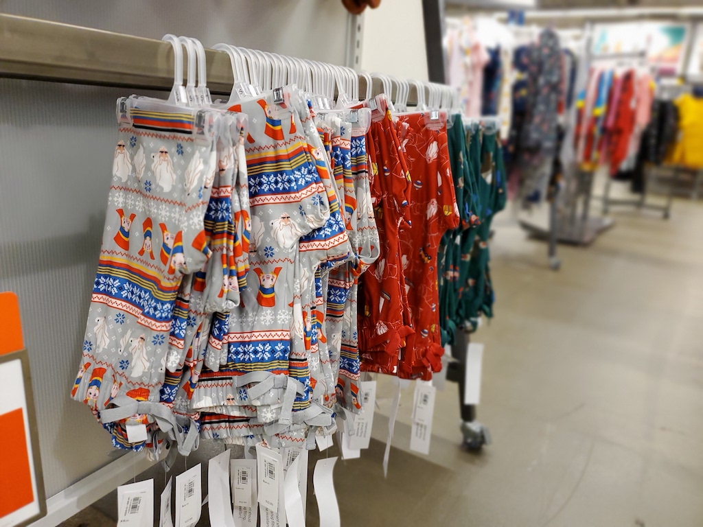 old navy pajama pants hanging on rack in store