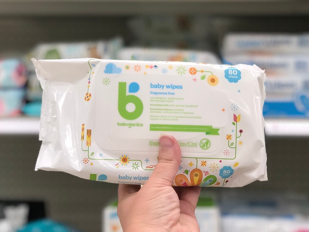 Babyganics Wipes Being held by a womans hand