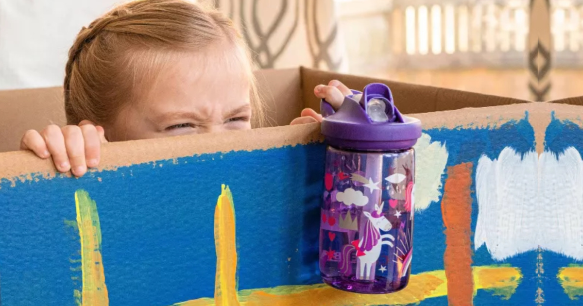 girl peeking out of a box holding a camelbak bottle