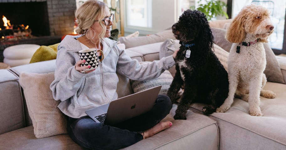 Collin with her dog and a computer