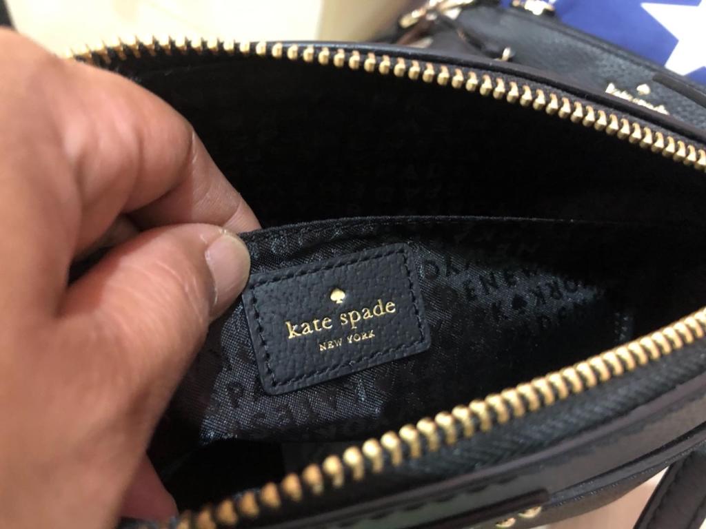 close up of Kate Spade purse tag