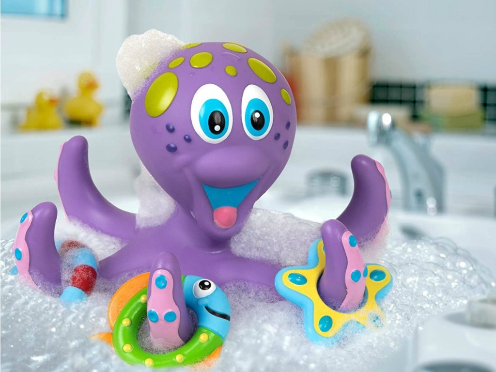 Octopus toy floating in bubblebath