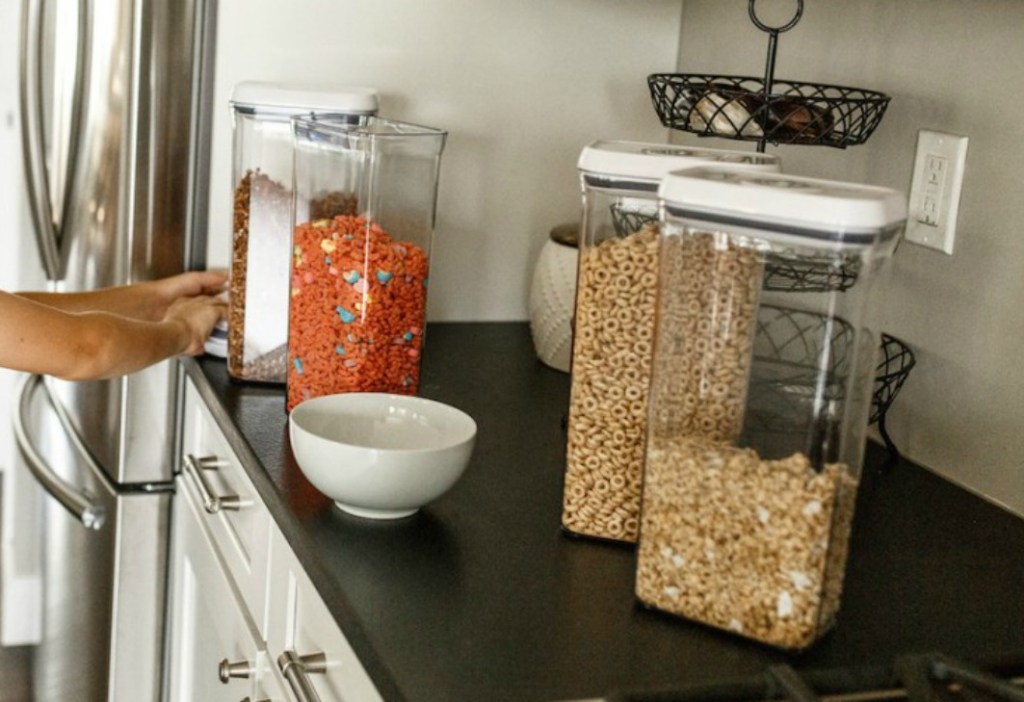 OXO containers on counter with cereals inside