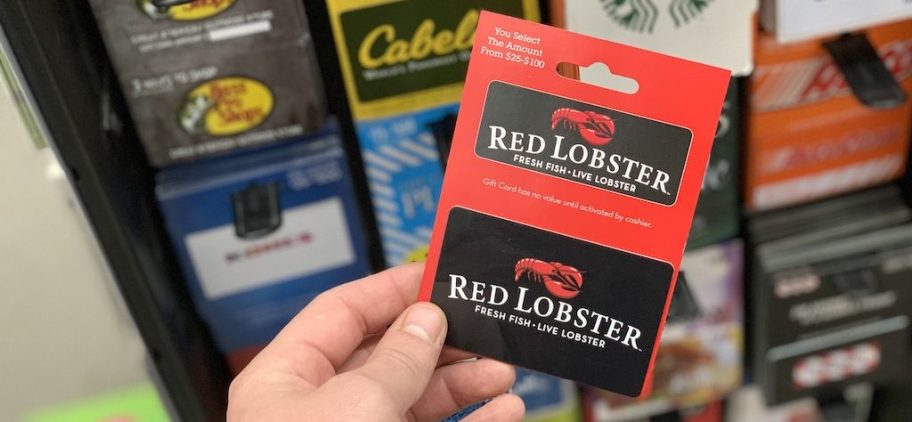 holding red lobster gift card