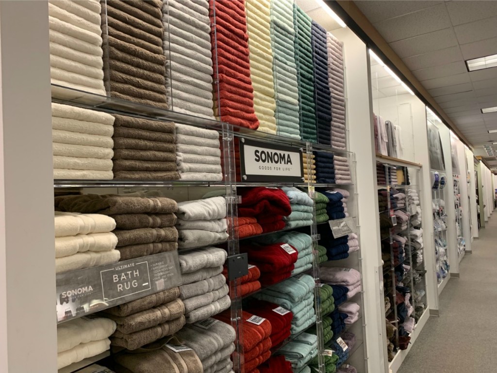 rows of towels on wall at Kohl's