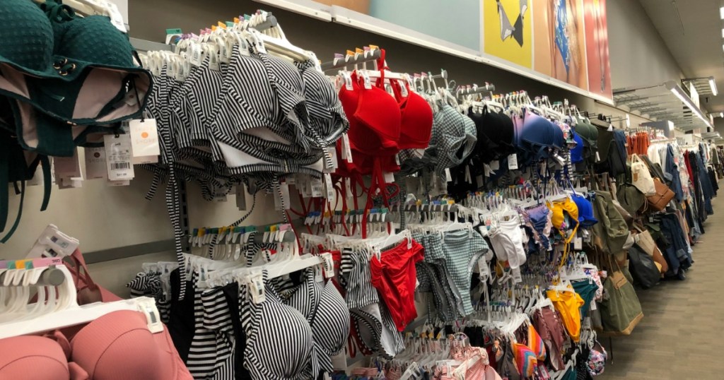 women's bikinis hanging on a wall at Target