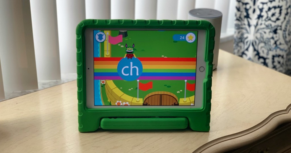 tablet with screen shot of teach your monster to read game