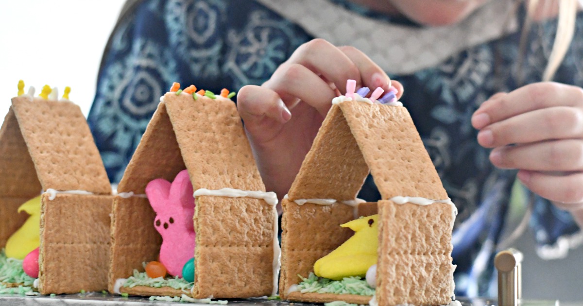 Fun kids' craft - putting together an Easter gingerbread house using graham crackers 