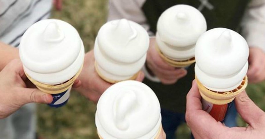 five vanilla ice cream cones held out by five different hands