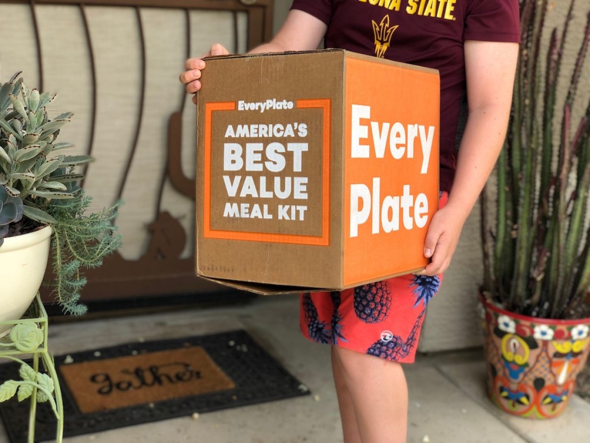 kid holding an Every Plate meal box