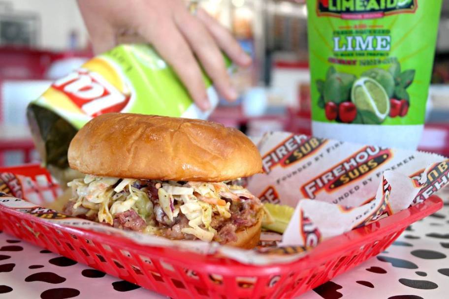 Firehouse Sub with drink and chips