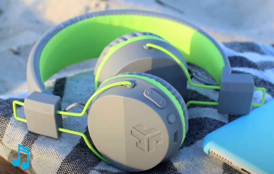 grey and green headphones