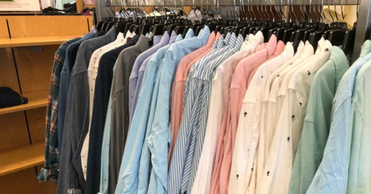 men's button-down shirts hanging on a rack