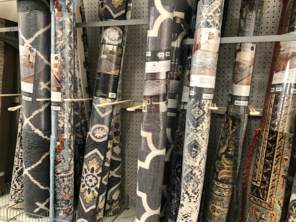 rugs on shelf at store 
