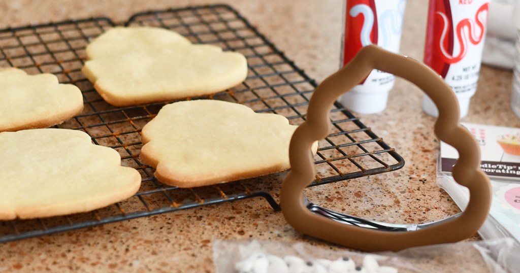 poop emoji shaped cut out cookies and cutter