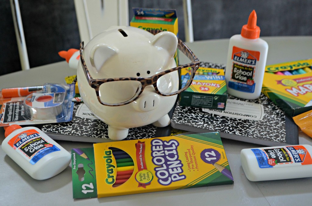 Piggy bank next to classroom essentials