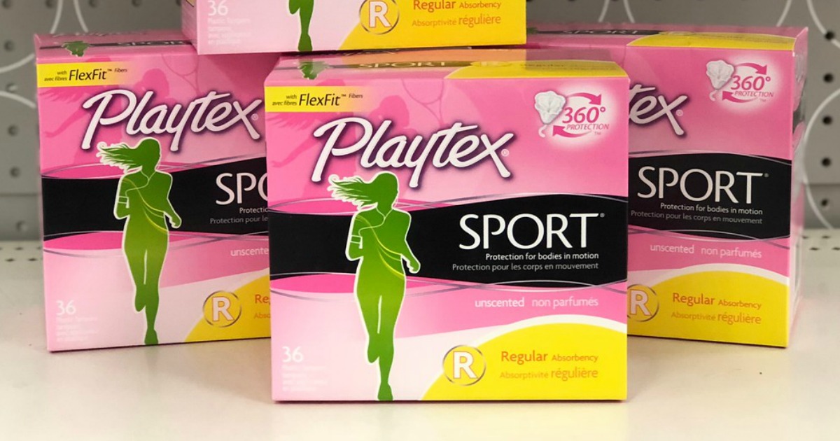 boxes of playtex sport tampons stacked on a table
