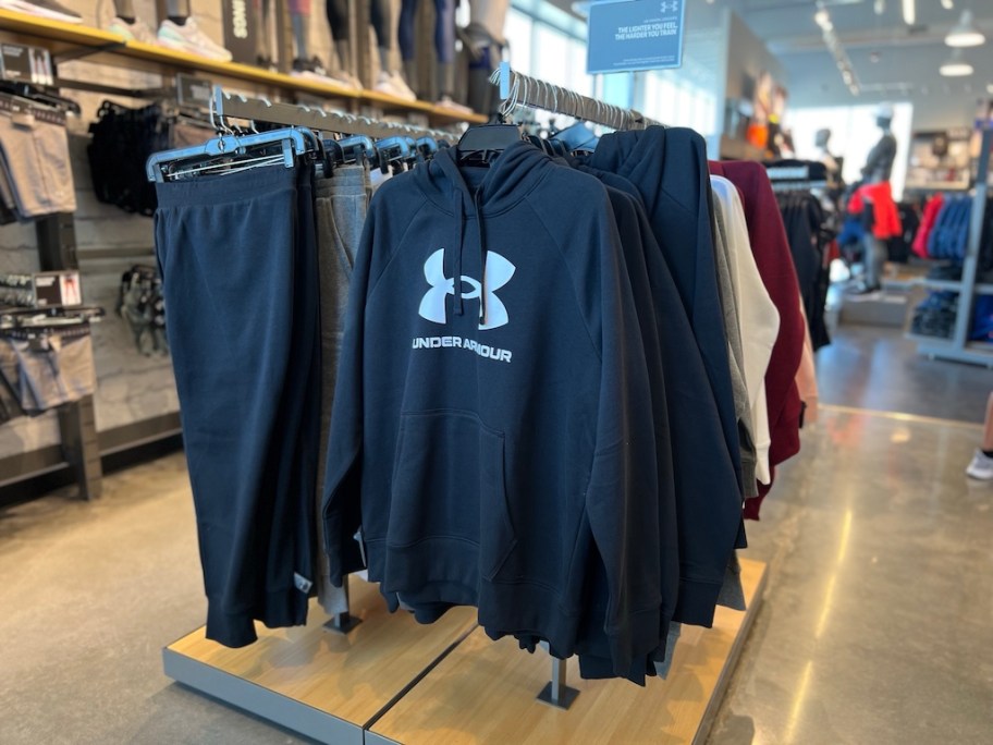 Under Armour joggers and hoodie in store