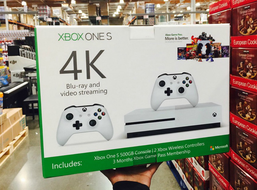 xbox one s 4k console held in store