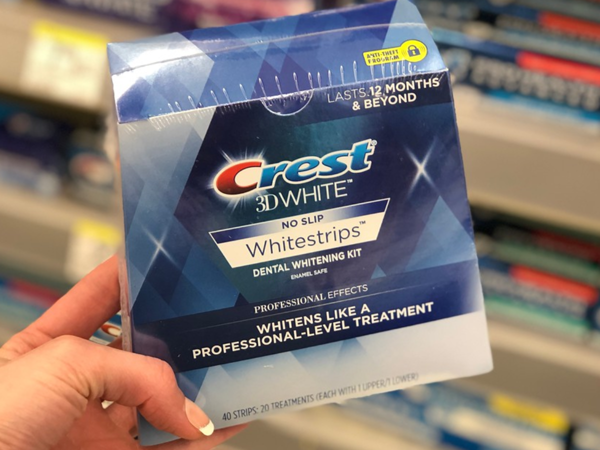 Crest 3D Whitestrips in woman's hand at Walgreens