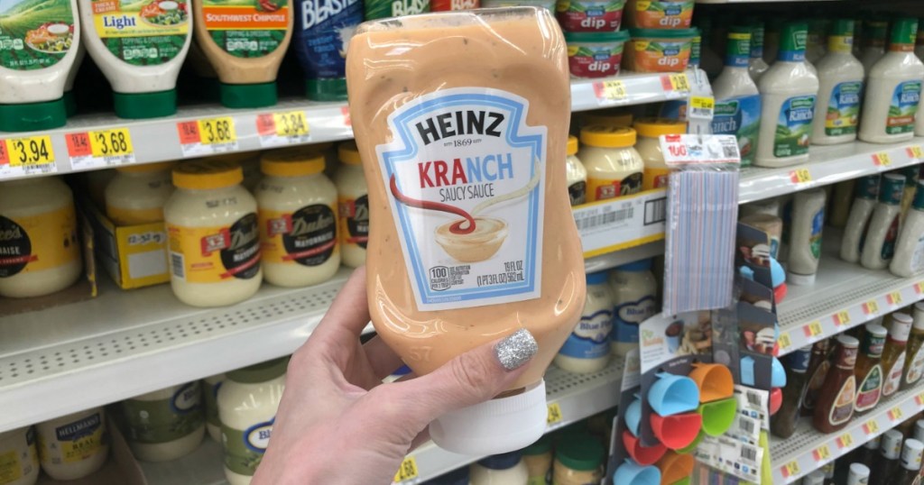 person holding Heinz Kranch Saucy Sauce