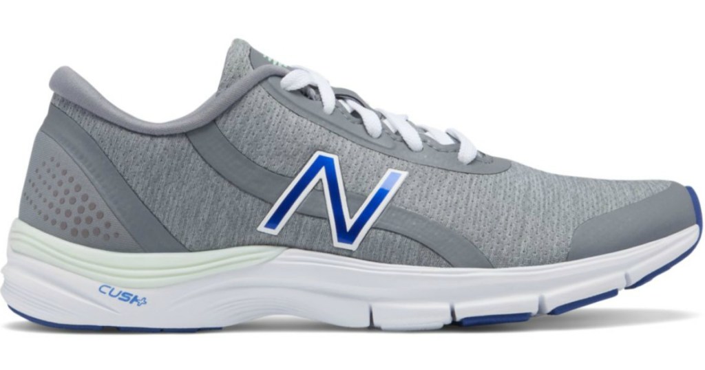 New Balance Women's Cross Training Grey Shoes with blue N, side view