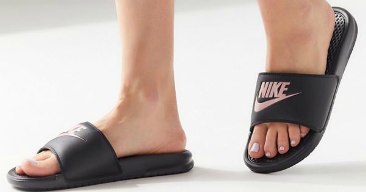 nike sandals on feet