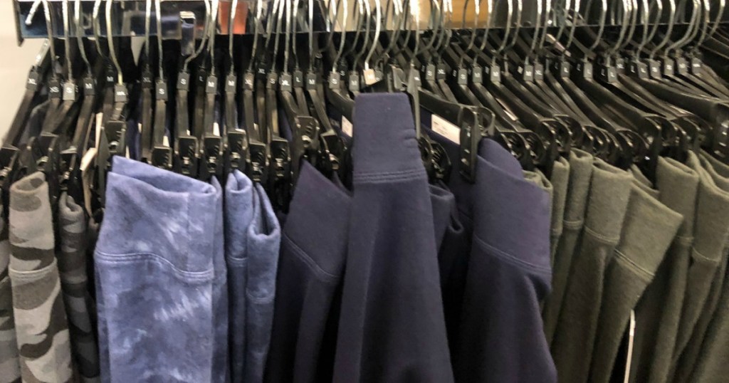 rack of womens leggings at a store