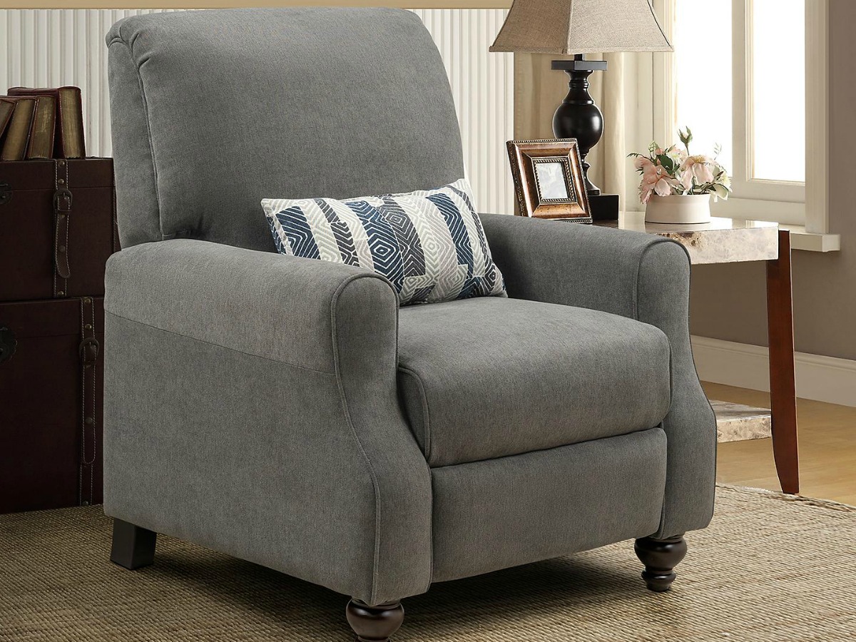 Shelby high leg recliner with accent pillow in living room setting