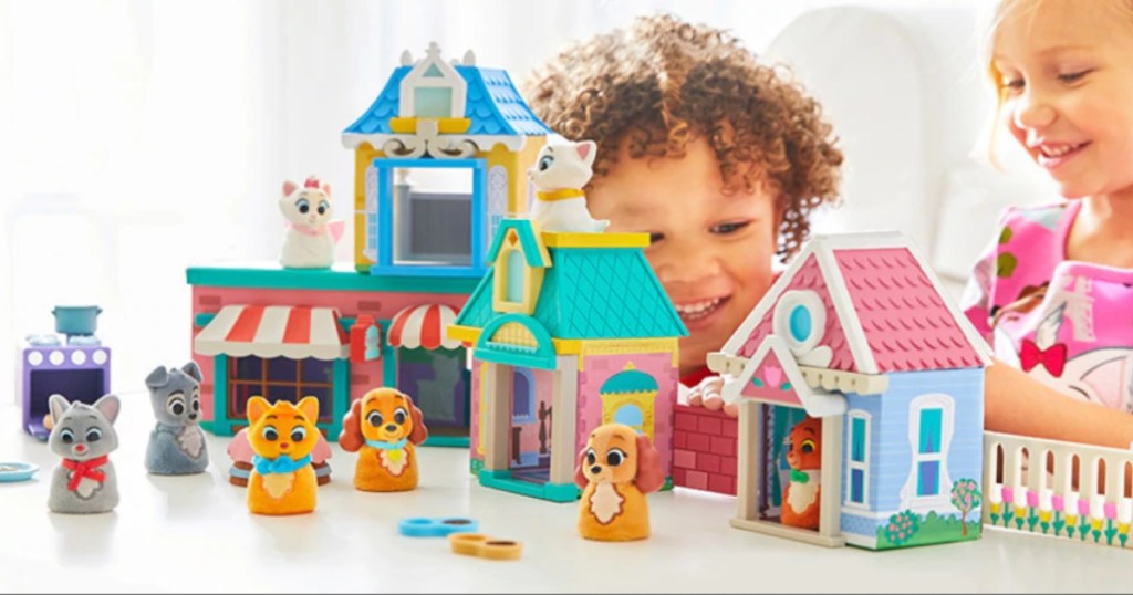 kids playing with disney playsets